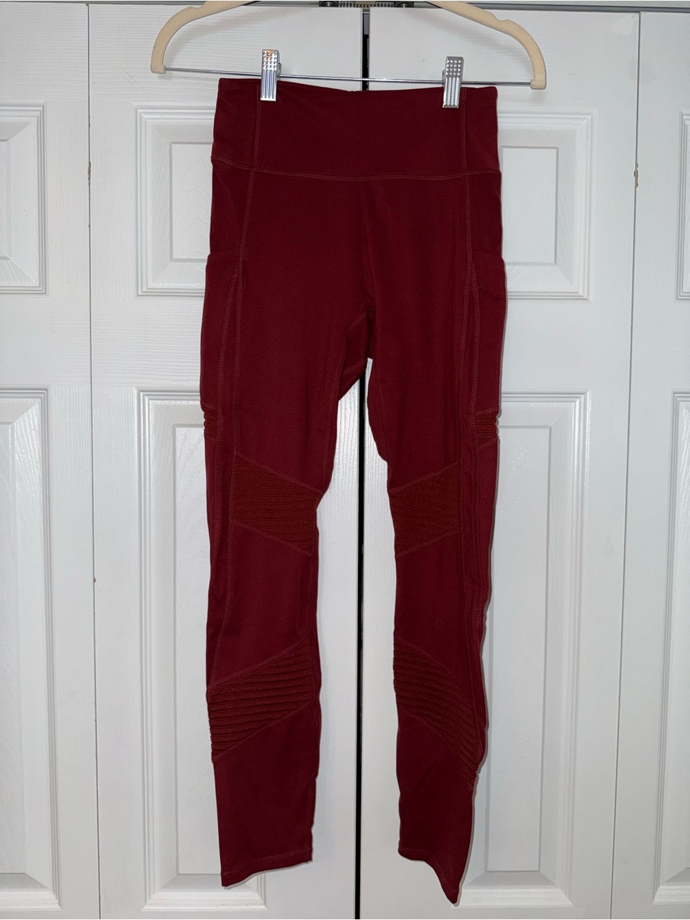 Fabletics Anywhere High-Waisted Moto 7/8 Workout Leggings with Pockets Wine Red